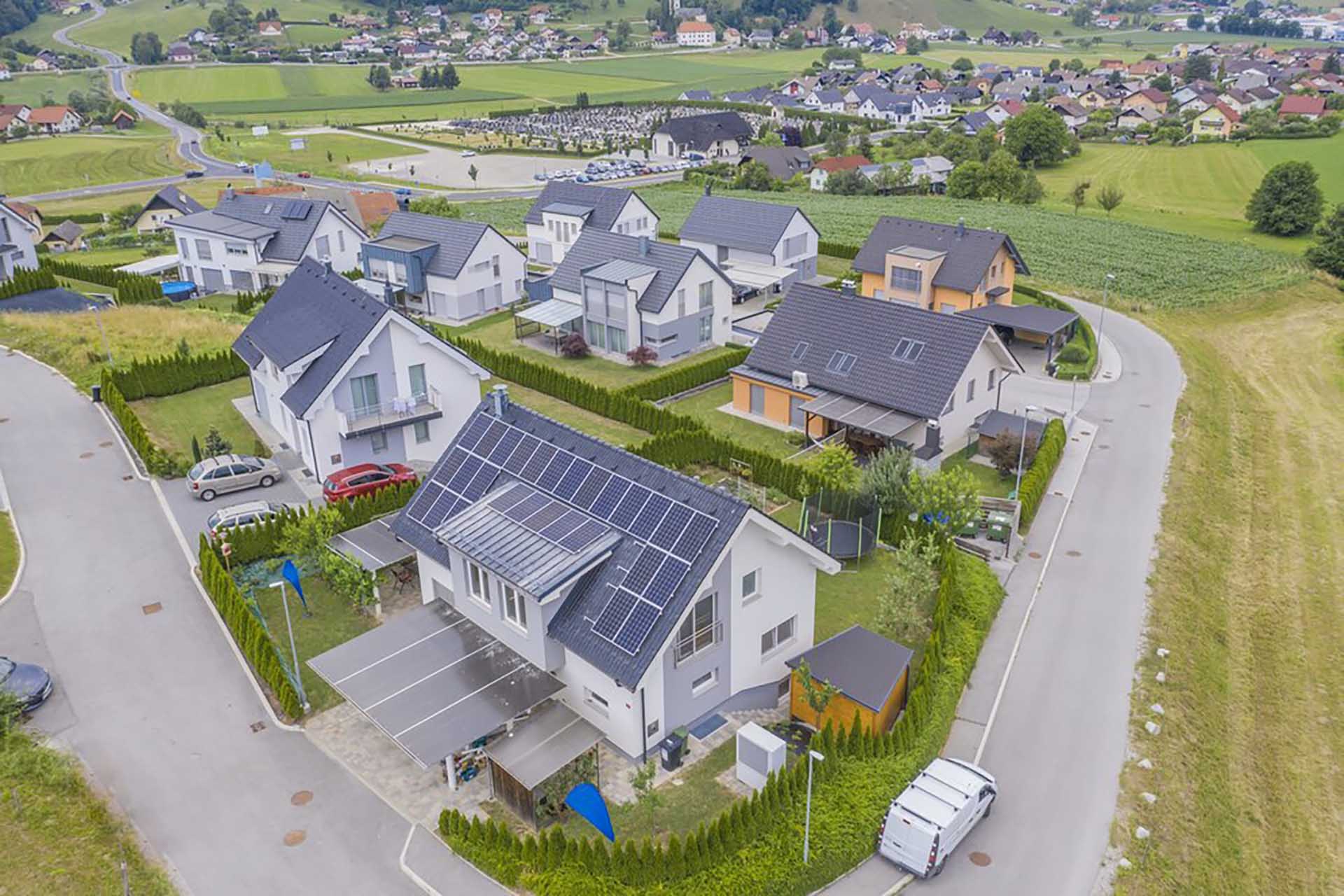 aerial-view-private-houses-with-solar-panels-roofs_181624-14567