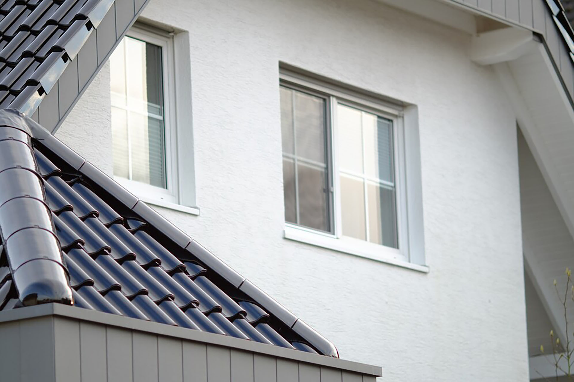 low-angle-shot-white-building-with-two-windows_181624-17390